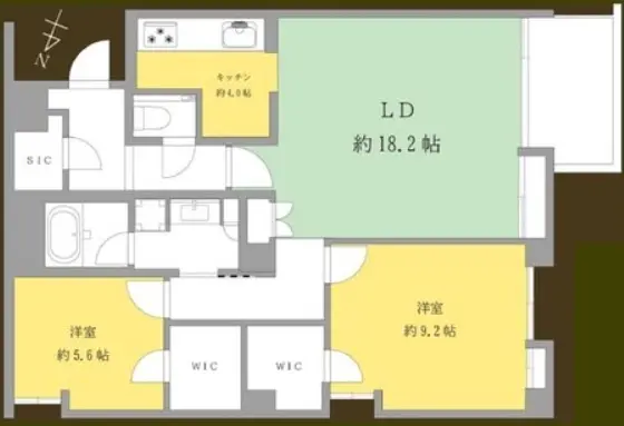 - 住宅の間取り図、リビングダイニング約18.2帖、キッチン約4.0帖、洋室約5.6帖と約9.2帖、ウォークインクローゼット(WIC)の配置を示す平面図