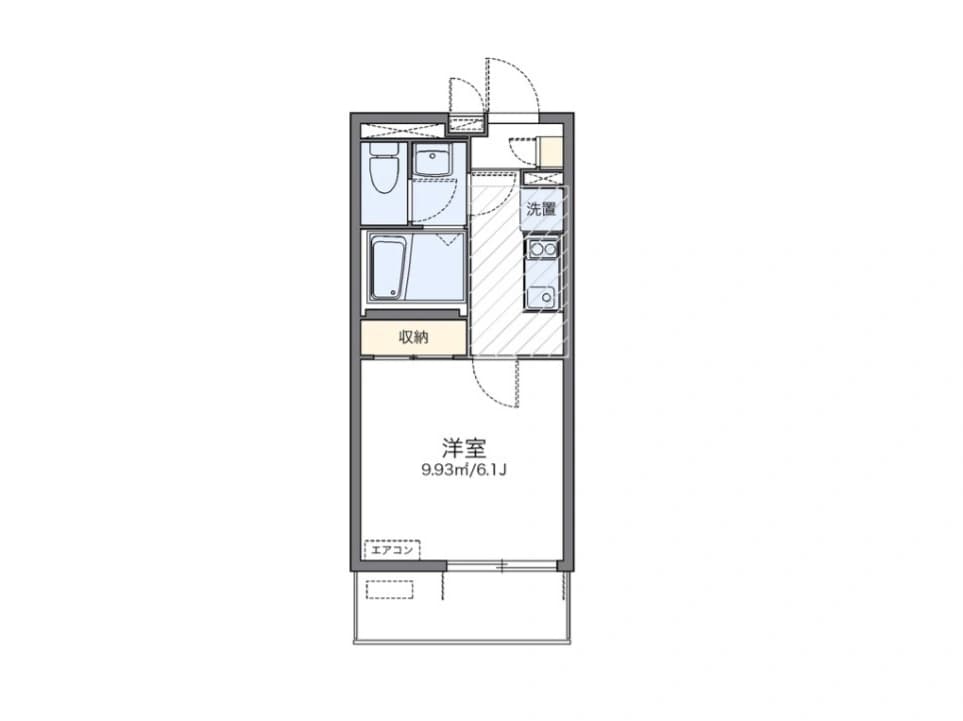 - ワンルームの間取り図、玄関近くにキッチンと洗濯機スペース、左上に浴室とトイレ、中央に収納、下部に洋室9.93㎡/6.1畳とバルコニー、エアコン設置箇所を示す平面図