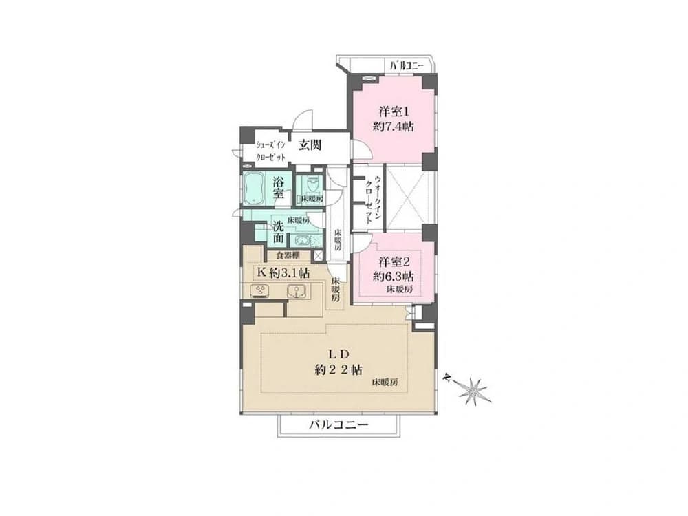 - 間取り図のマンション平面図、LD約22畳のリビングダイニングとK約3.1畳のキッチン、洋室1約7.4畳、洋室2約6.3畳、浴室・洗面・玄関・ウォークインクローゼット、バルコニーと北西を示す方位マップ付きの室内インテリア平面図