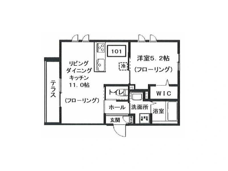 - 間取図のアパート平米図、リビングダイニングキッチン11畳と洋室5.2畳、テラス・WIC・浴室・洗面所・トイレ・玄関・ホールを配置した間取り図